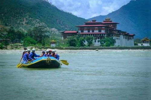 The Po Chu and Mo Chu Rivers in Bhutan meet at the dramatic 17th century Punakha Dzong monastery